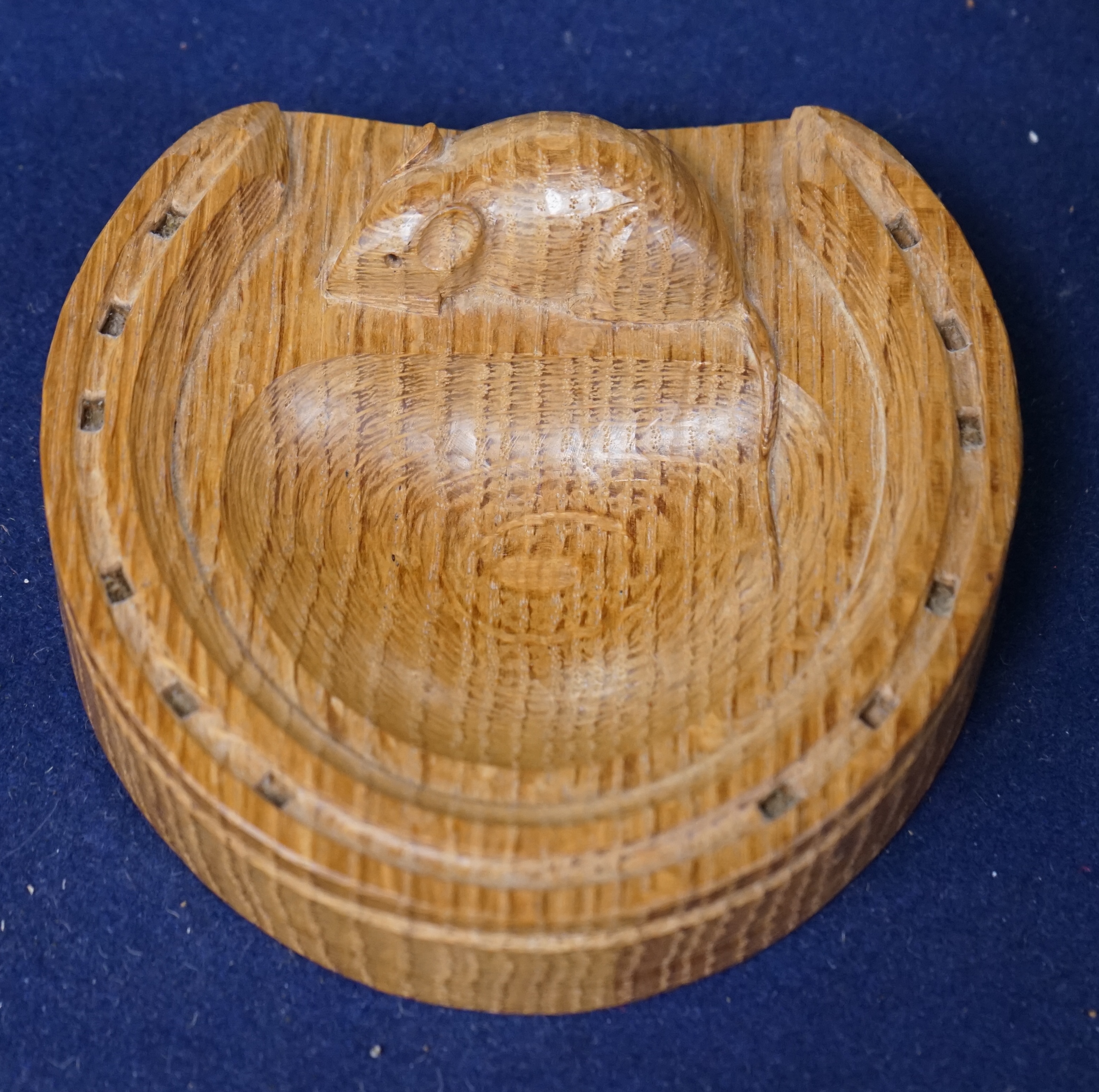 Workshop of Robert 'Mouseman' Thompson, an oak ‘horseshoe’ pin tray, 12.5cm. Condition - good